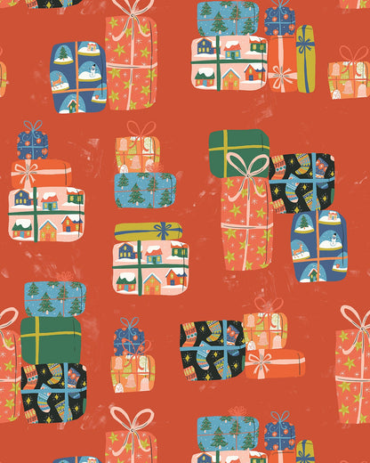 A fabric with a Christmas-themed pattern featuring motifs of presents, houses, stockings, stars, and trees in vintage colors on an red background.